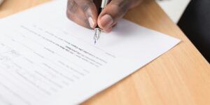 signing a paper