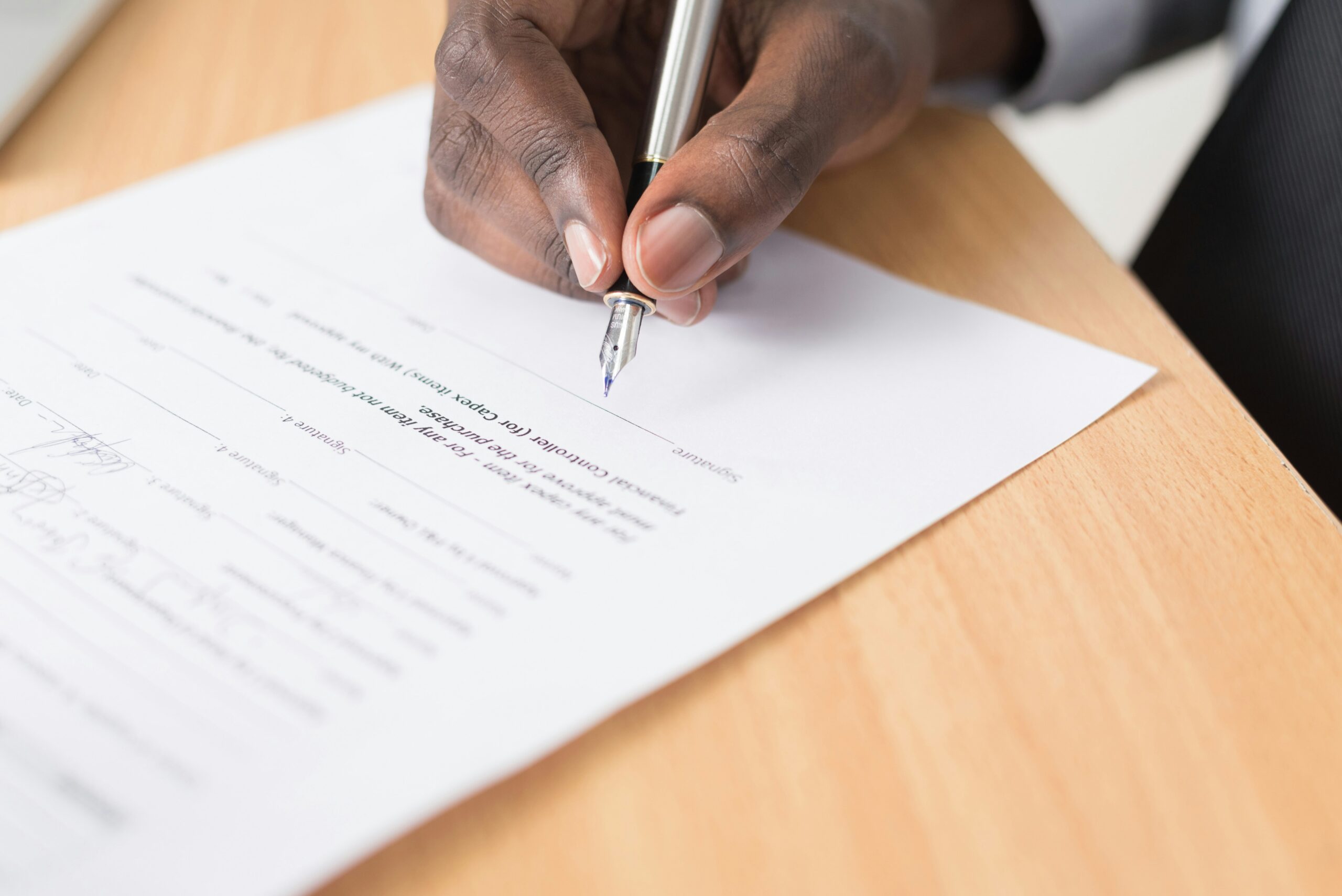 signing a paper