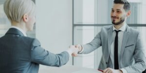 two people shaking hands