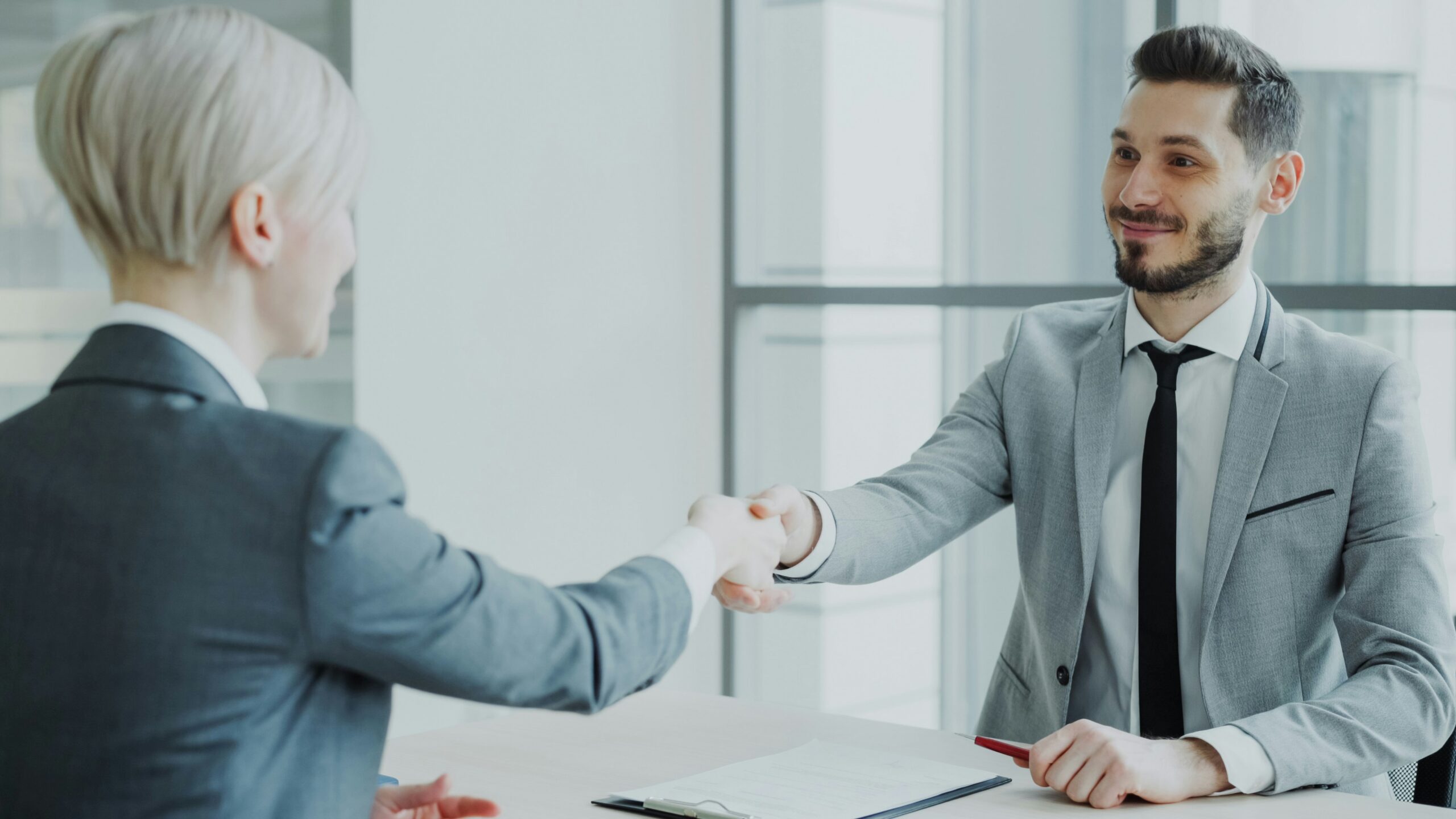 two people shaking hands